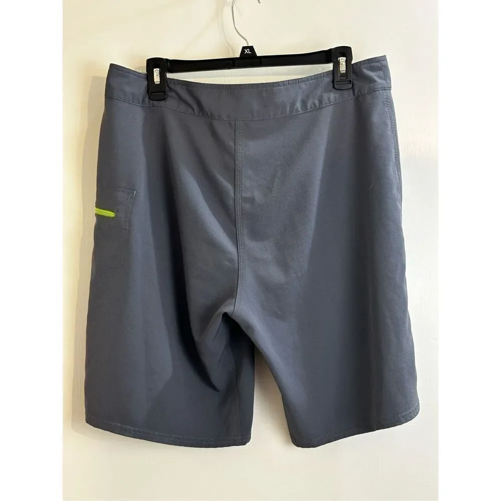 The North Face size 34 Men’s board shorts gray/ lime green